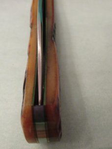 Queen Titusville PA. Amber Carved Stag Bone Mountain Man Pattern # 3