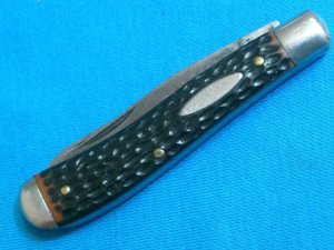 VINTAGE MONARCH 2211 JAPAN JIGGED DELRIN 2 BLADE TRAPPER FOLDING POCKET KNIVES OLD
