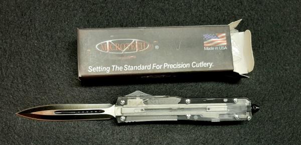 OTF with See-through Handle. 
