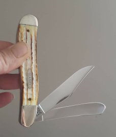 Roman Numeral stamp SC6240 dogleg trapper, Second Cut Burnt White Bone Handles