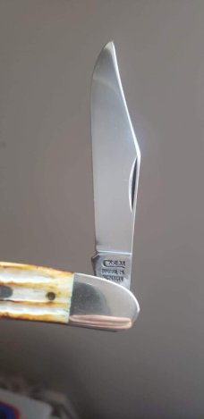 Roman Numeral stamp SC6240 dogleg trapper, Second Cut Burnt White Bone Handles