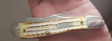 Roman Numeral stamp SC6240 dogleg trapper, Second Cut Burnt White Bone Handles