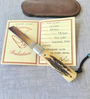 Vincenzo Balistreri Sambar Stag and San Mai White Wolf...4" closed..interior lanyard and bead..coa/s