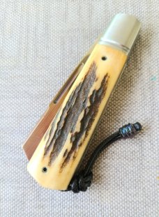 Vincenzo Balistreri Sambar Stag and San Mai White Wolf...4" closed..interior lanyard and bead..coa/s