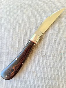 K'roo Desert Ironwood Swayback..Rwl34...3.75" closed...filework..fluted..red liners..coa and slip