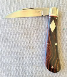 K'roo Desert Ironwood Swayback..Rwl34...3.75" closed...filework..fluted..red liners..coa and slip