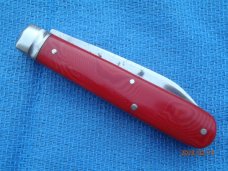 Utica (arch) Cutlery Co Utica NY Red Swirl Barehead Jack