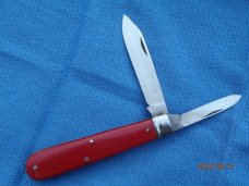 Utica (arch) Cutlery Co Utica NY Red Swirl Barehead Jack