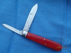 Utica (arch) Cutlery Co Utica NY Red Swirl Barehead Jack