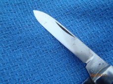Utica (arch) Cutlery Co Utica NY Red Swirl Barehead Jack