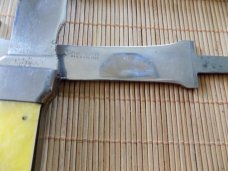 Vintage KA-BAR Knife/Hatchet Combo with sheath.