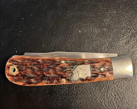 KA-BAR DOG HEAD SIMILAR BABY BULLET