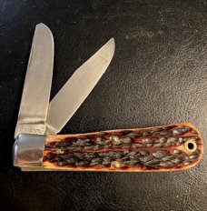 KA-BAR DOG HEAD SIMILAR BABY BULLET