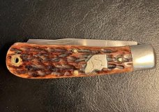 KA-BAR DOG HEAD SIMILAR BABY BULLET