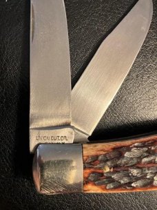 KA-BAR DOG HEAD SIMILAR BABY BULLET