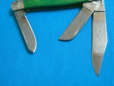 ROUGH RIDER BONE GREEN STOCKMAN RR1057 STROKE OF LUCK HORSESHOE FOLDING POCKET KNIFE KNIVES MIB BOX