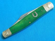ROUGH RIDER BONE GREEN STOCKMAN RR1057 STROKE OF LUCK HORSESHOE FOLDING POCKET KNIFE KNIVES MIB BOX