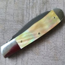 Jeff Pearce Gold lip and GoMai Wharncliffe Trapper...31 layer stainless Blade...4" closed..coa.pouch