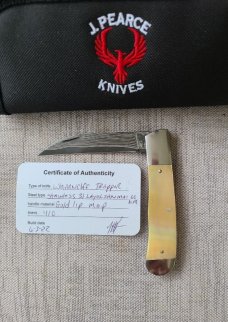 Jeff Pearce Gold lip and GoMai Wharncliffe Trapper...31 layer stainless Blade...4" closed..coa.pouch