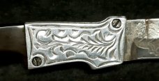 RPK Hand engraved bolsters and blade. 