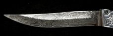 RPK Hand engraved bolsters and blade. 