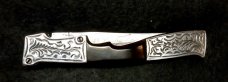 RPK Hand engraved bolsters and blade. 