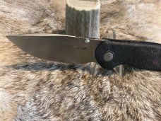 Viper / Flipper with Purple Dark Matter Carbon Fiber & MagnaCut Drop Point blade.