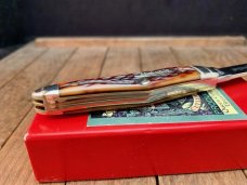 Robeson by Queen Humpback Split Back Spring Whittler Carmel Worm Groove Bone