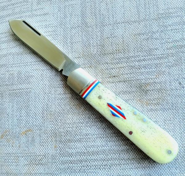 Robbie Ferreira Giraffe Bone Straight jack.N690..4" closed..fluted bolsters and special shield..sli 