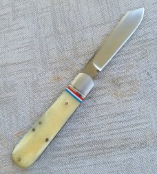 Robbie Ferreira Giraffe Bone Straight jack.N690..4" closed..fluted bolsters and special shield..sli 