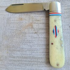 Robbie Ferreira Giraffe Bone Straight jack.N690..4" closed..fluted bolsters and special shield..sli 