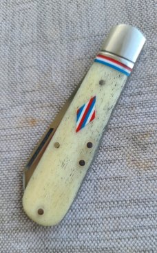 Robbie Ferreira Giraffe Bone Straight jack.N690..4" closed..fluted bolsters and special shield..sli 