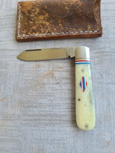 Robbie Ferreira Giraffe Bone Straight jack.N690..4" closed..fluted bolsters and special shield..sli 