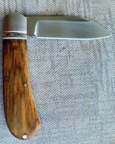 Robbie Ferreira African Stinkwood Zulu...N690..3.75" closed..fluted bolsters ..African Leather slip