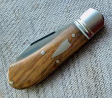 Robbie Ferreira African Stinkwood Zulu...N690..3.75" closed..fluted bolsters ..African Leather slip