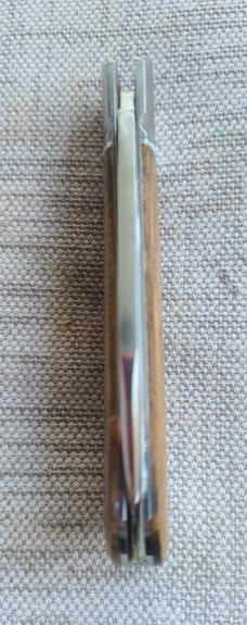 Robbie Ferreira African Stinkwood Zulu...N690..3.75" closed..fluted bolsters ..African Leather slip