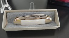 GEORGE WOSTENHOLM I*XL M. O. P,  3 BLADE CANOE 