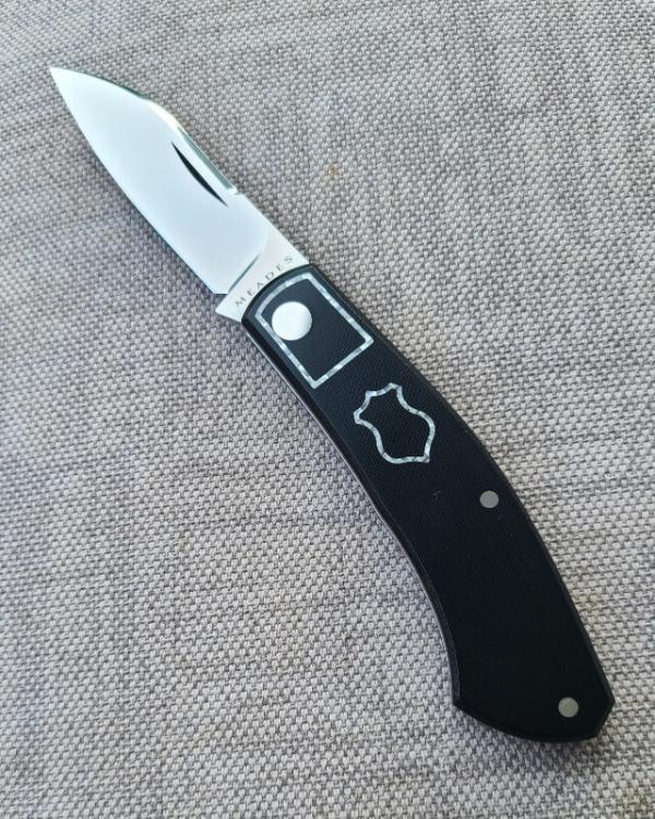 Meades Mini Dino...N690..Black Micarta..Silver Twill Skelton Shield..3 5/8"..DOB 9/20..BOX..COA Meades Mini Dino...N690..Black Micarta..Silver Twill Skelton Shield..3 5/8"..DOB 9/20..BOX..COA