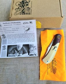 Johan Ellis Igwe.Lanny..4",Warthog Tusk Ivory with Karellian bols ...G10 and titanium frame...Rwl34 