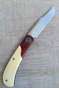 Johan Ellis Igwe.Lanny..4",Warthog Tusk Ivory with Karellian bols ...G10 and titanium frame...Rwl34 