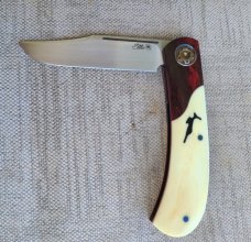 Johan Ellis Igwe.Lanny..4",Warthog Tusk Ivory with Karellian bols ...G10 and titanium frame...Rwl34 
