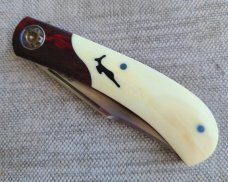 Johan Ellis Igwe.Lanny..4",Warthog Tusk Ivory with Karellian bols ...G10 and titanium frame...Rwl34 