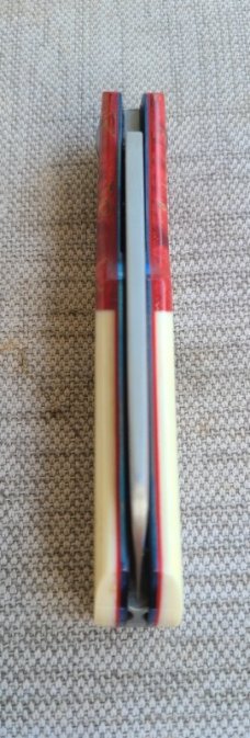 Johan Ellis Gunstock..4",Warthog Tusk Ivory with Karellian bols ...G10 and titanium frame...Rwl34 