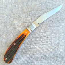 Jennings Trapper..Magnacut blade..Amber Bone..Jeweled bolsters..liners & shield..coa & box. 3.75"
