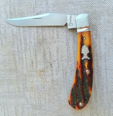 Jennings Trapper..Magnacut blade..Amber Bone..Jeweled bolsters..liners & shield..coa & box. 3.75"