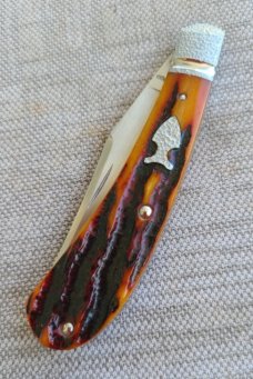 Jennings Trapper..Magnacut blade..Amber Bone..Jeweled bolsters..liners & shield..coa & box. 3.75"