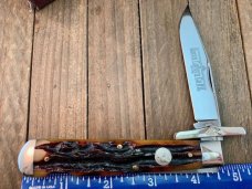 Queen Cutlery Swing Guard Amber Carved Stag Bone