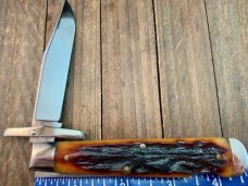 Queen Cutlery Swing Guard Amber Carved Stag Bone