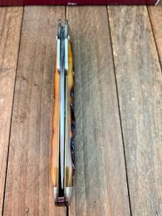 Queen Cutlery Swing Guard Amber Carved Stag Bone