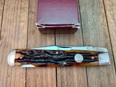 Queen Cutlery Swing Guard Amber Carved Stag Bone